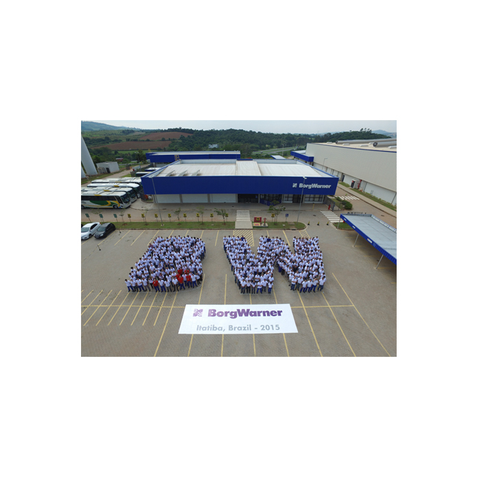 Employees spelling out the letters BW