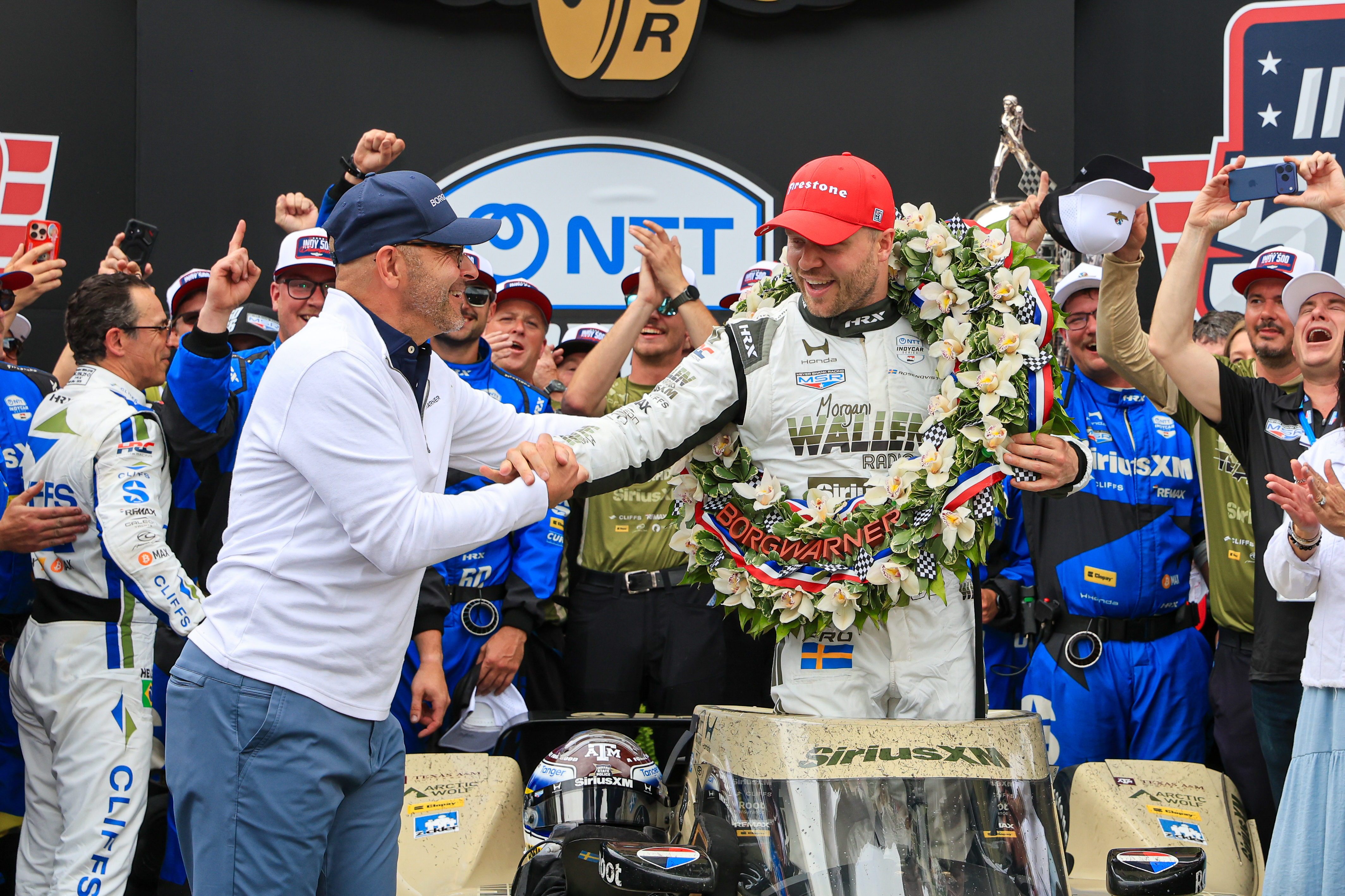 Felix Rosenqvist and Joseph Fadool celebrate in Victory Circle