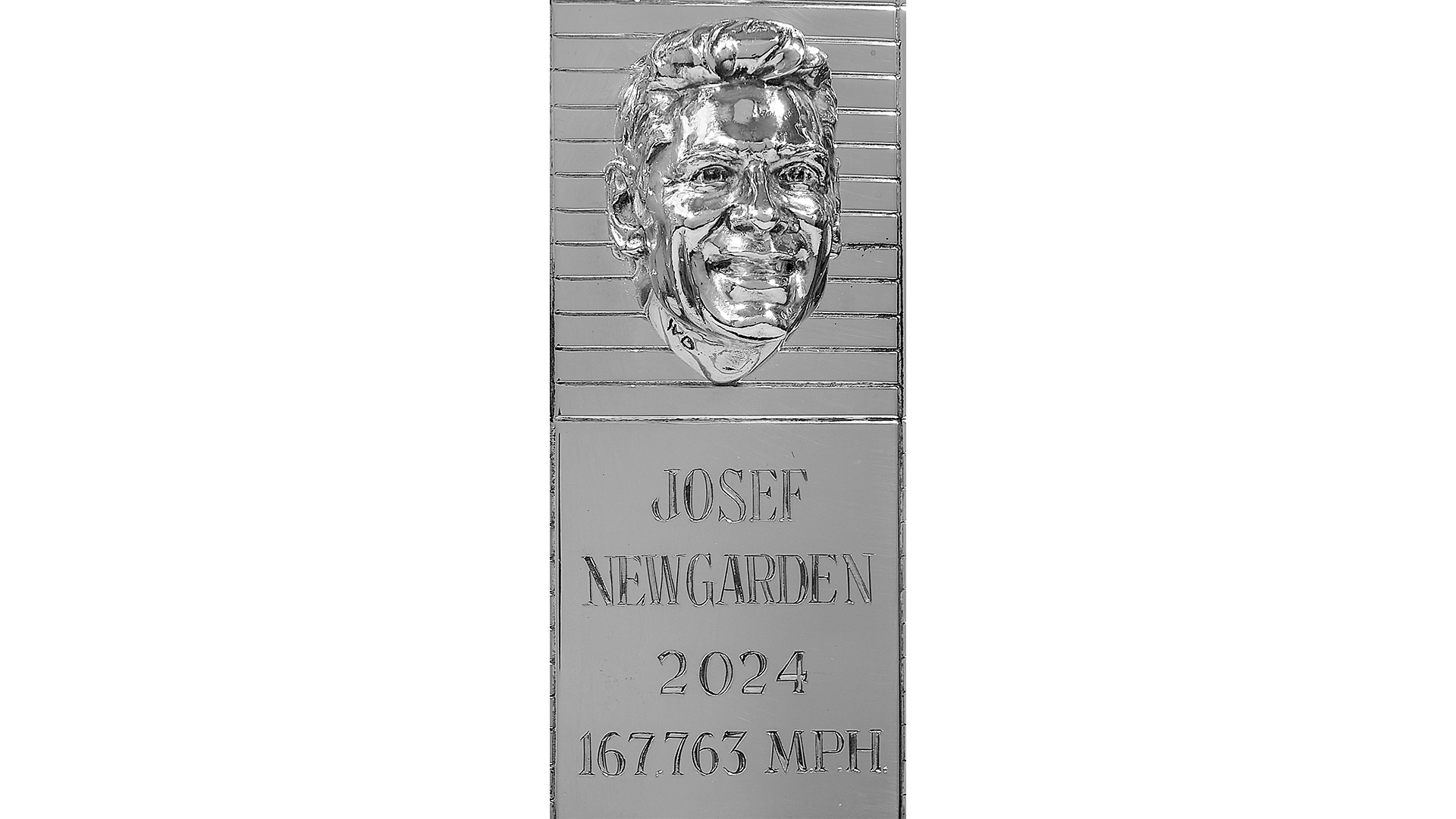 Close up image of sterling silver trophy featuring 2024 Indianapolis 500 winner Josef Newgarden's likeness