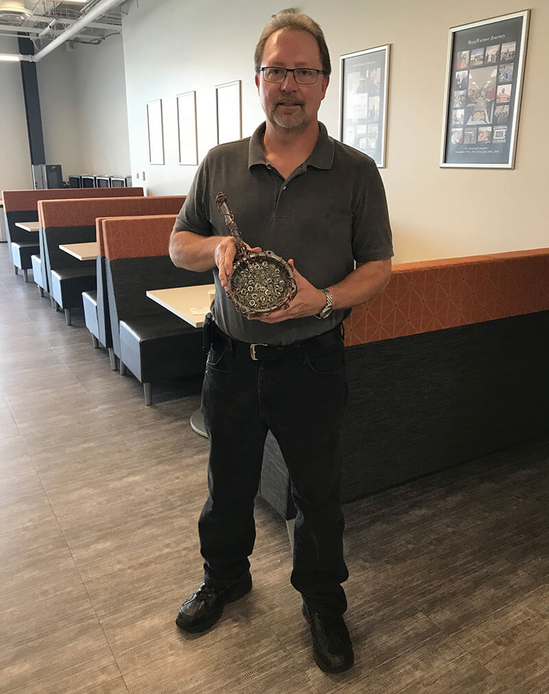 Man holding trophy