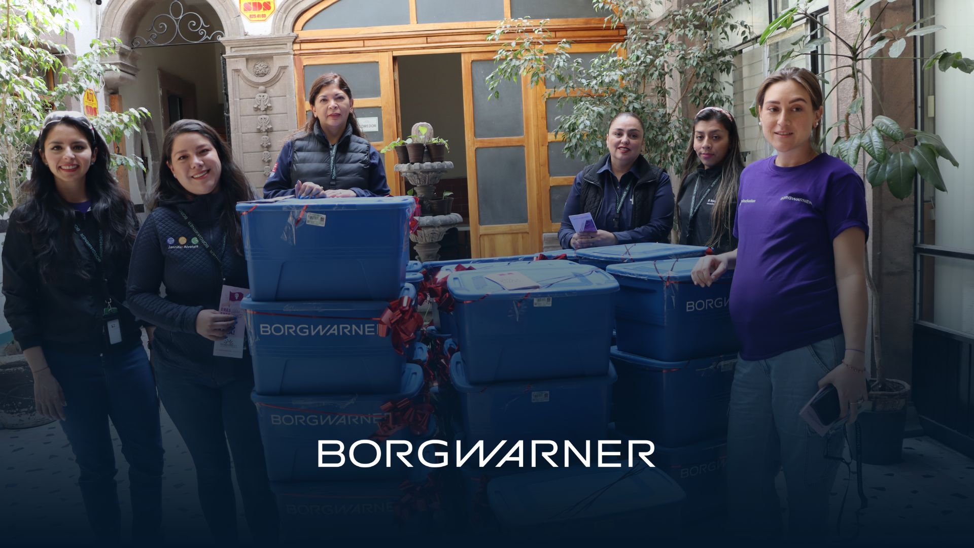 People standing with bins