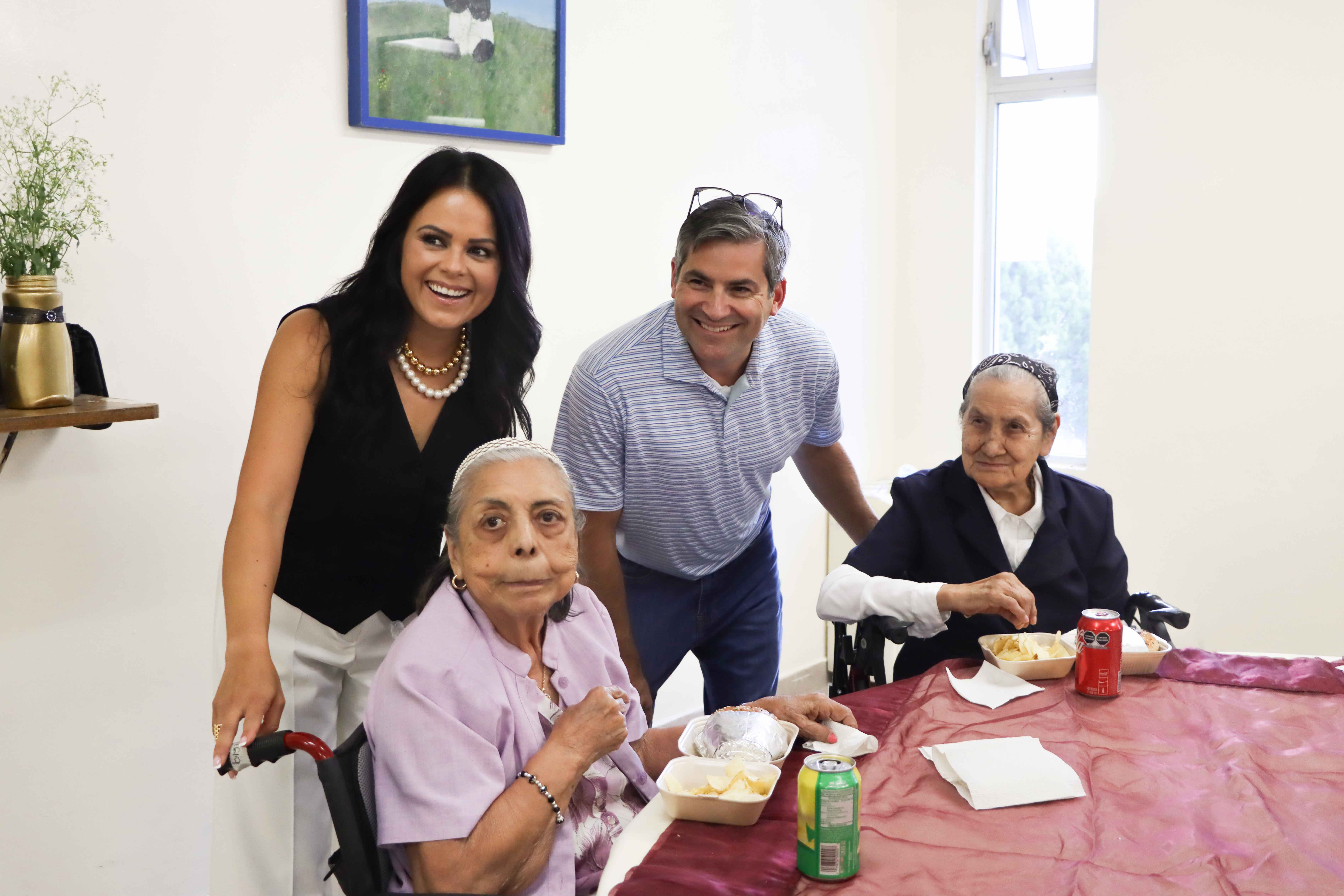 Smiling people at a table