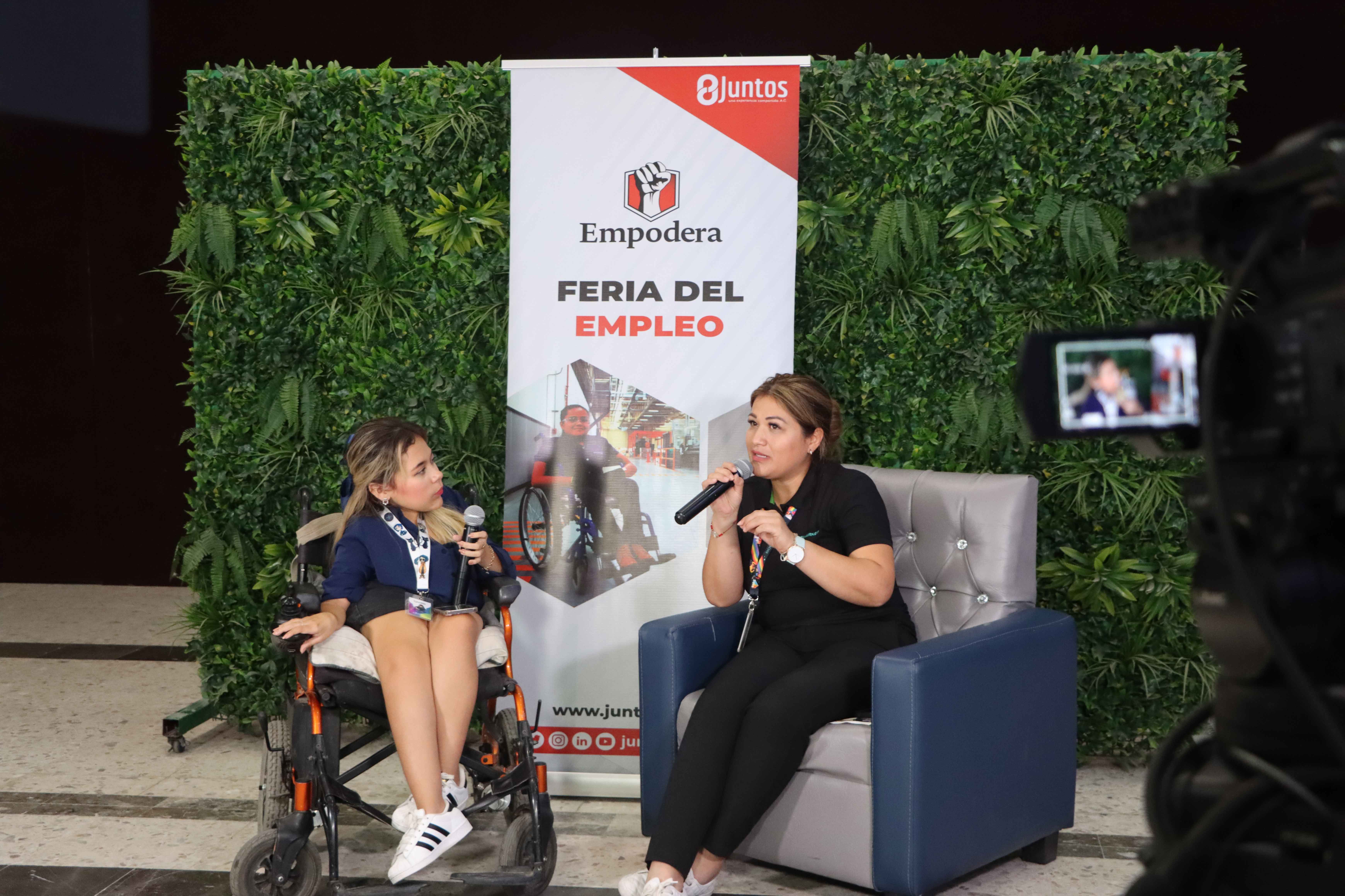 Two women speaking into microphones