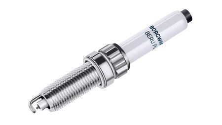 A white and silver spark plug made of steel and ceramic